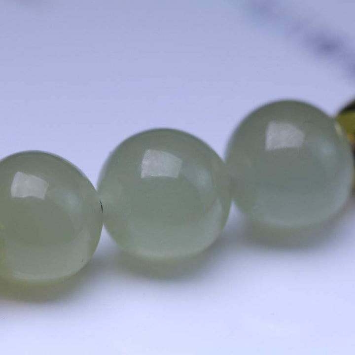 Buddha Stones天然翡翠蓮の実の強さの赤い糸織りブレスレット