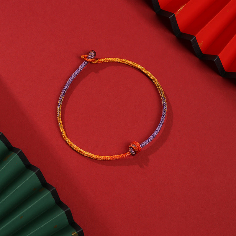 Buddha Stonesの手作りカラフルな紫と金の赤い編みロープブレスレット