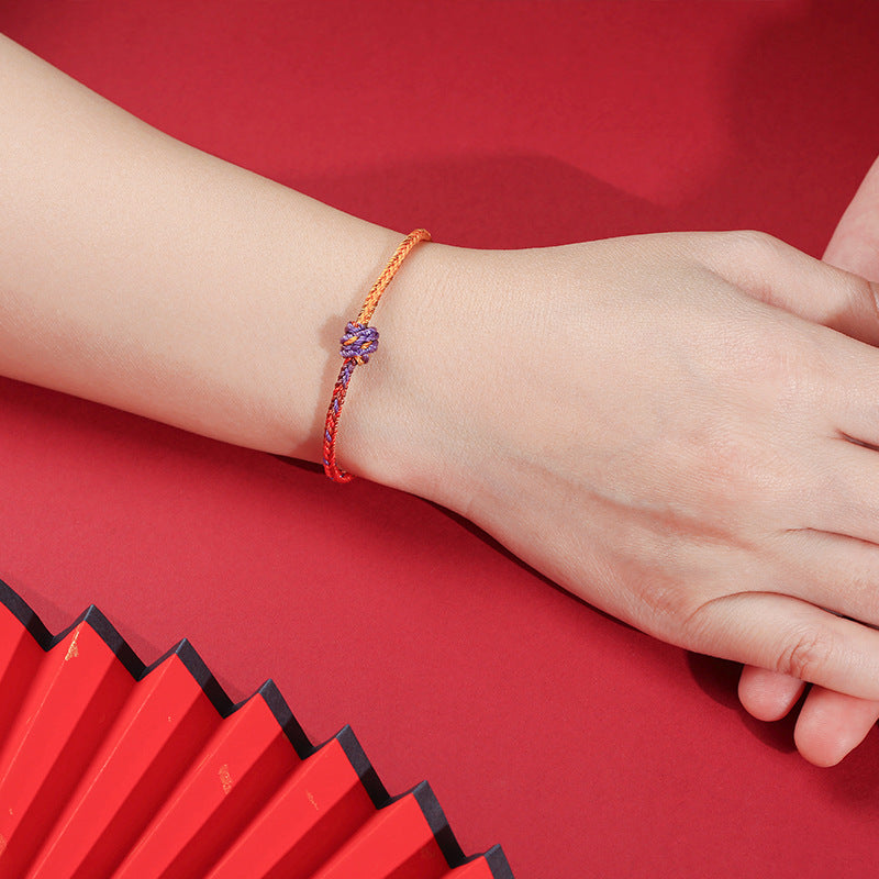 Buddha Stonesの手作りカラフルな紫と金の赤い編みロープブレスレット