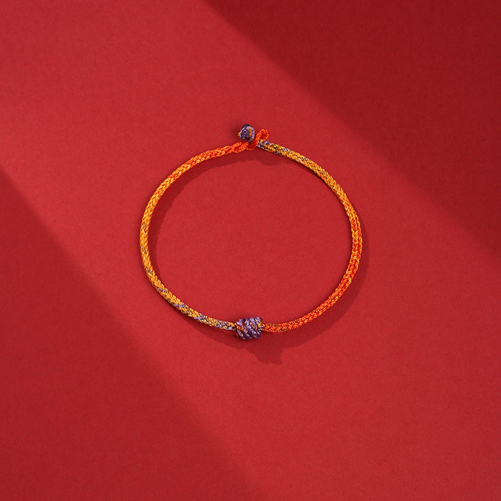 Buddha Stonesの手作りカラフルな紫と金の赤い編みロープブレスレット