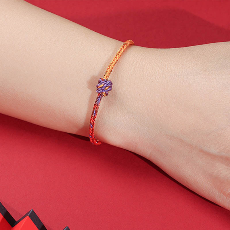 Buddha Stonesの手作りカラフルな紫と金の赤い編みロープブレスレット