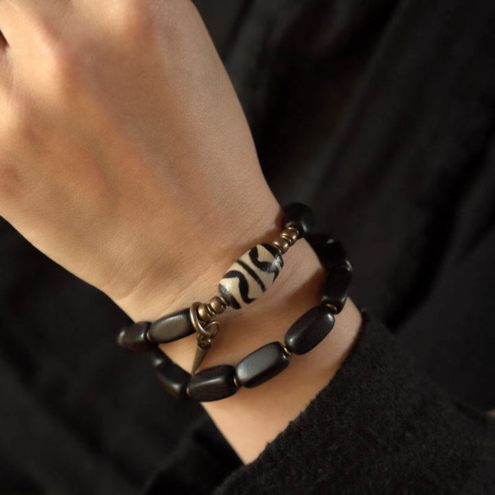 Buddha Stonesチベット 黒檀 木製 Dzi ビーズ 銅製 バランス ダブルラップブレスレット