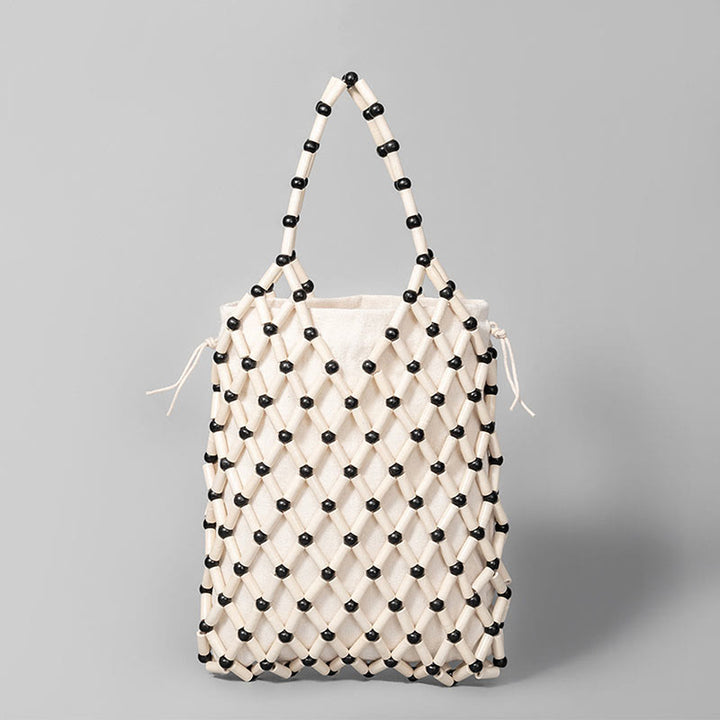 Buddha Stonesの手編みメッシュ中空木製ビーズハンドバッグ