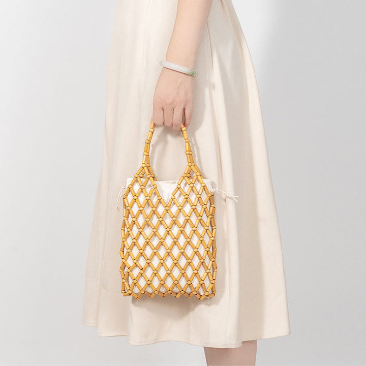 Buddha Stonesの手編みメッシュ中空木製ビーズハンドバッグ