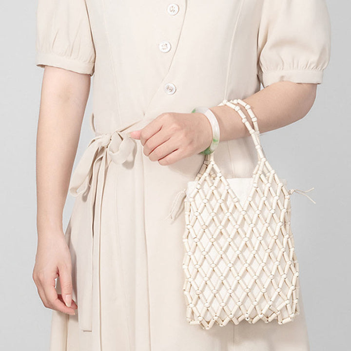 Buddha Stonesの手編みメッシュ中空木製ビーズハンドバッグ