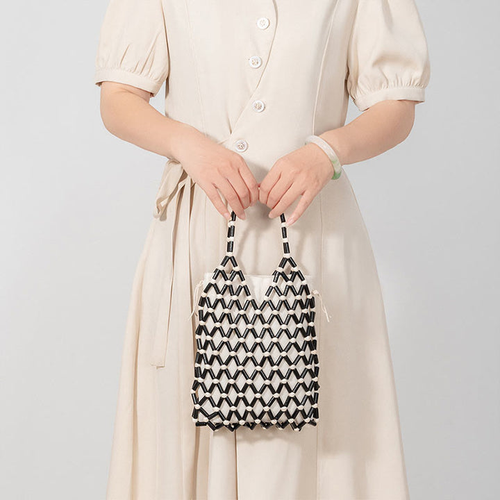 Buddha Stonesの手編みメッシュ中空木製ビーズハンドバッグ