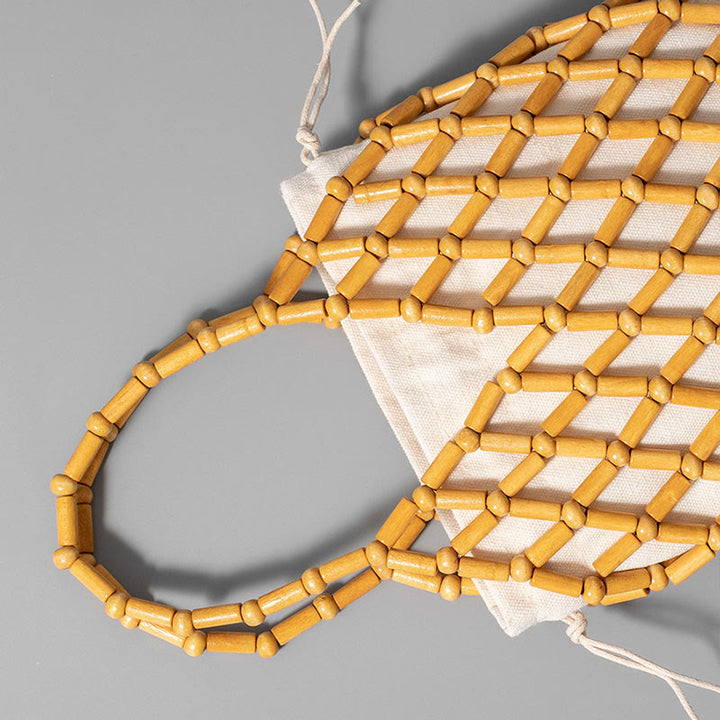 Buddha Stonesの手編みメッシュ中空木製ビーズハンドバッグ