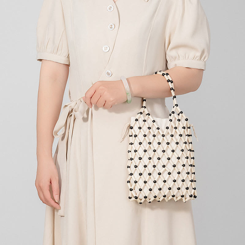 Buddha Stonesの手編みメッシュ中空木製ビーズハンドバッグ