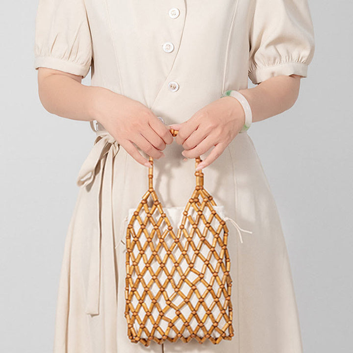 Buddha Stonesの手編みメッシュ中空木製ビーズハンドバッグ