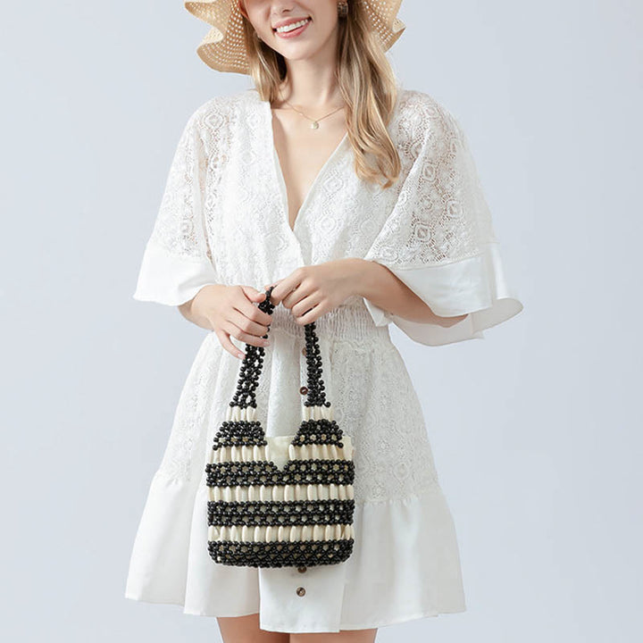 Buddha Stonesの手編み丸型木製ビーズショルダーバッグ