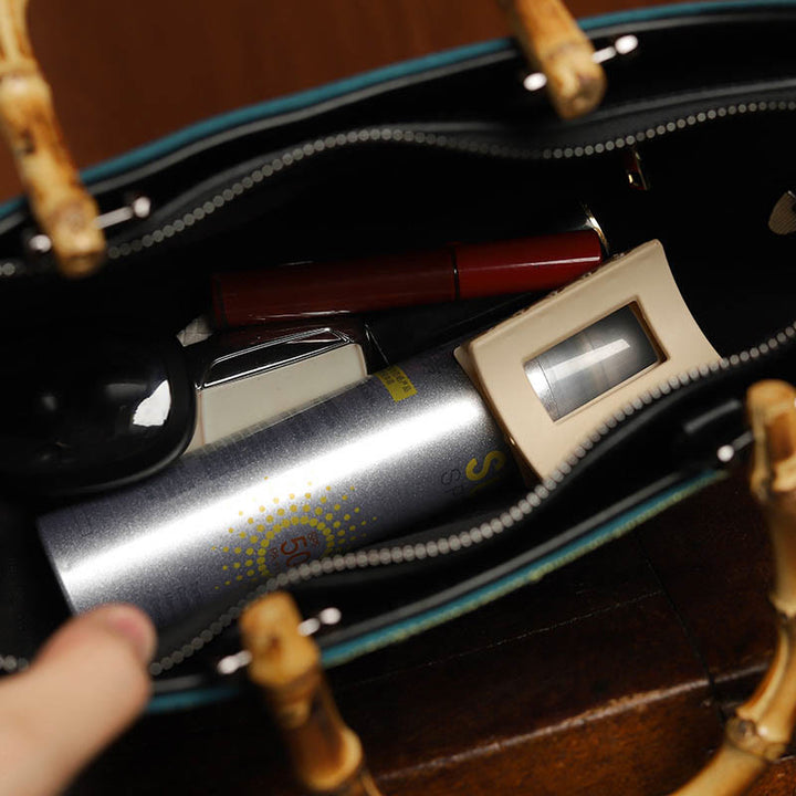 Buddha Stonesと蓮の刺繍が施された竹製ハンドルのハンドバッグ