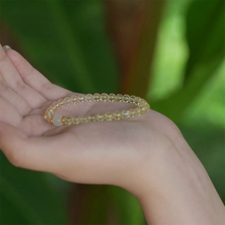 Buddha Stonesの小さなシトリン翡翠ビーズの繁栄のブレスレット
