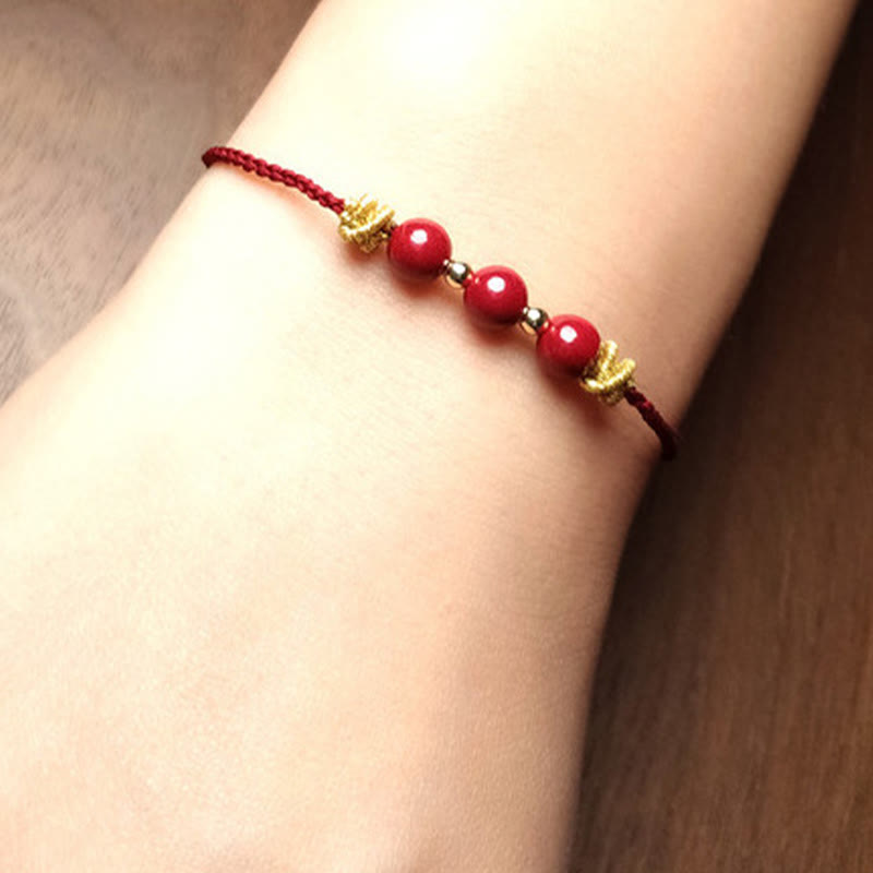 Buddha Stonesのカラフルな紐、辰砂の落ち着いたブレスレット