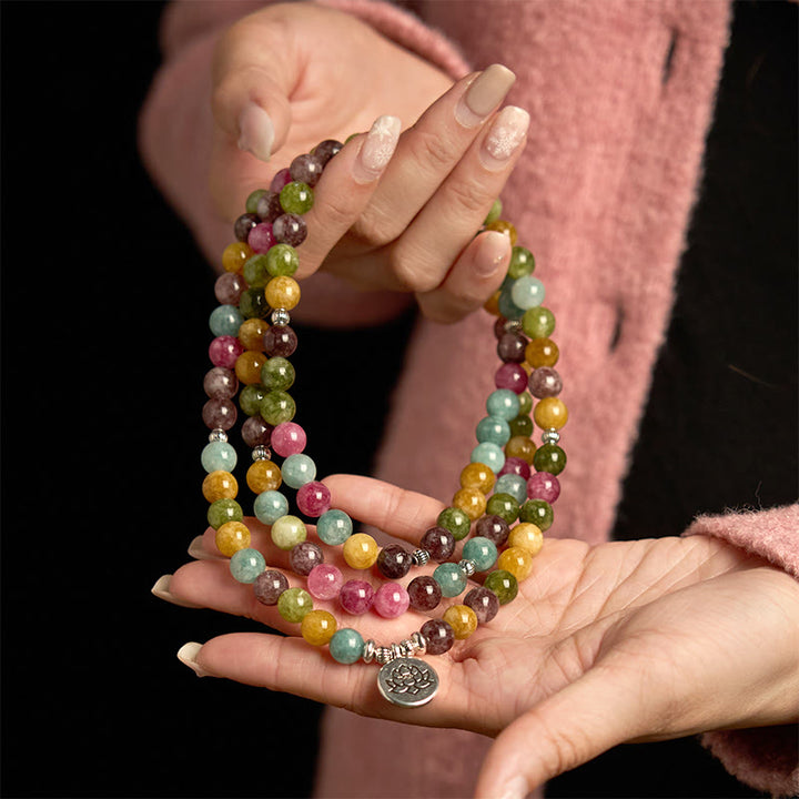 Buddha Stones 108 個入りMalaビーズ 多層天然トルマリン 蓮の知恵ブレスレット