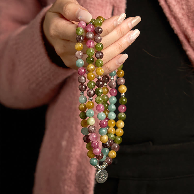 Buddha Stones 108 個入りMalaビーズ 多層天然トルマリン 蓮の知恵ブレスレット