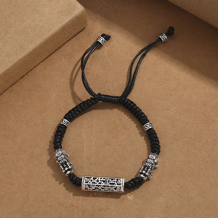 Buddha Stonesチベット黒紐 銅製オーム・マニ・パドメ・フムPiXiu編み込みブレスレット