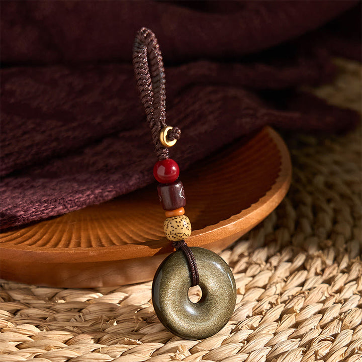 Buddha Stones天然ゴールド光沢黒曜石平和バックル強化キーチェーン