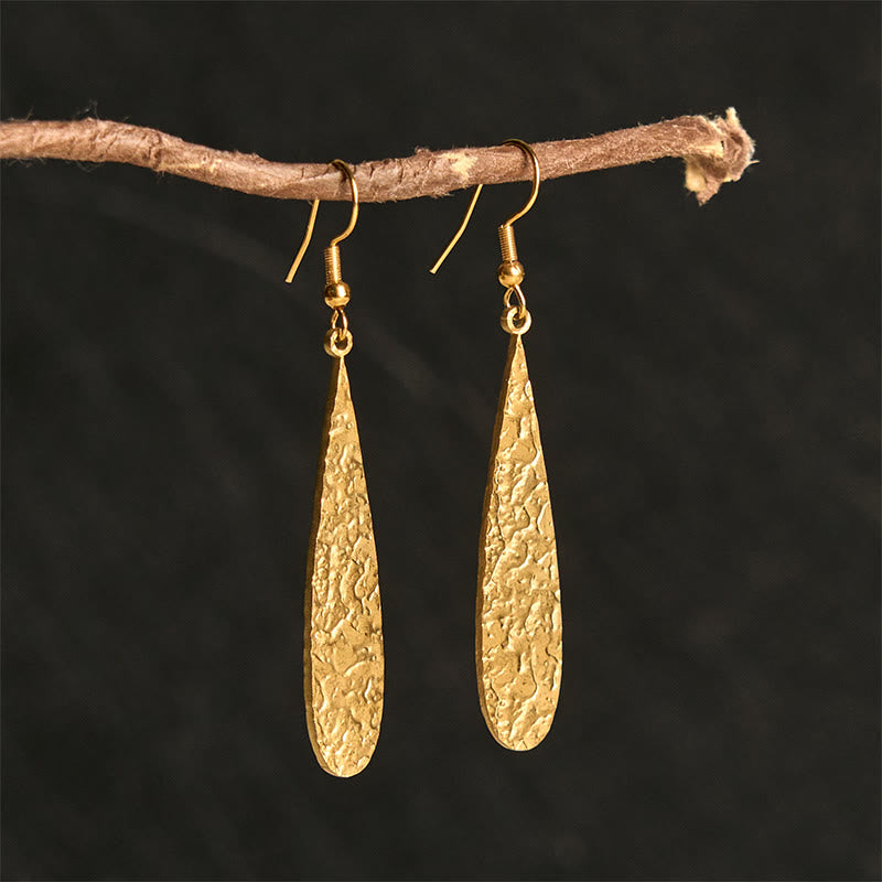 Buddha Stonesのエレガントなチタン鋼製バランスハンマーマークイヤリング - ゴールデンティアドロップシェイプ(チタンスチールポスト) - image 0