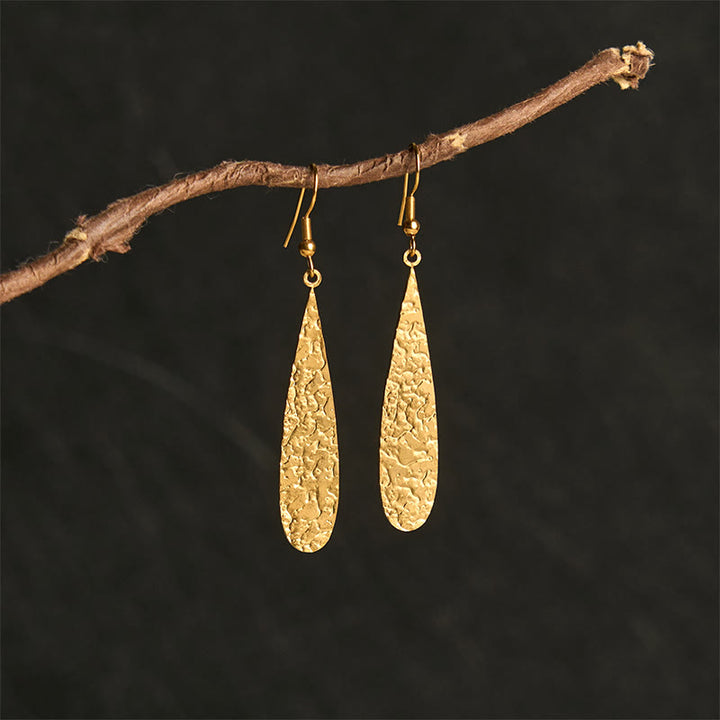 Buddha Stonesのエレガントなチタン鋼製バランスハンマーマークイヤリング - image 1