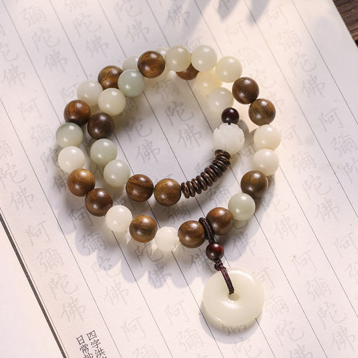 Buddha Stonesの種 グリーンサンダルウッド 蓮の平和のお守りチャームハーモニー ダブルラップブレスレット