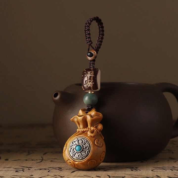 Buddha Stones小葉 紅白檀 緑白檀 マネーバッグOm Mani Padme Hum回転式保護吊り下げ装飾