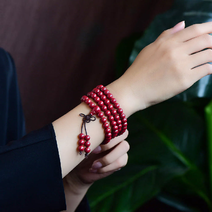 Buddha Stones 108Malaビーズ 辰砂Om Mani Padme Hum模様 刻印入り 祝福ブレスレット