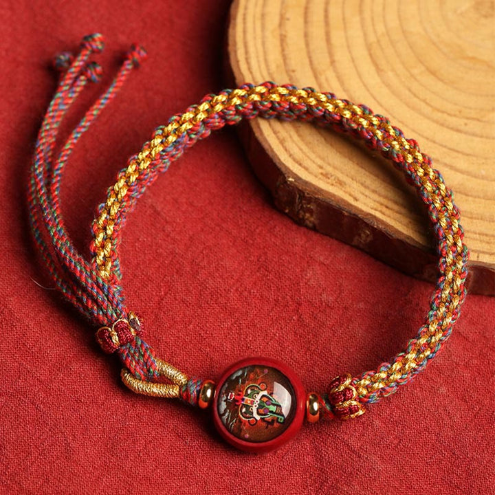 Buddha Stonesのカラフルなロープの辰砂タンカの祝福編みブレスレット