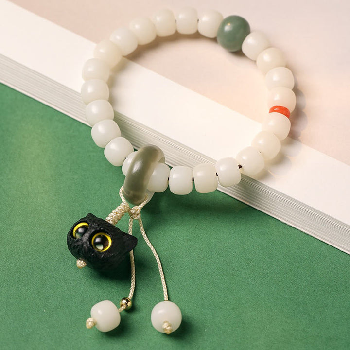 Buddha Stones天然菩提樹 アフリカンブラックウッド 愛らしい猫のチャーム 平和と調和のブレスレット - image 2