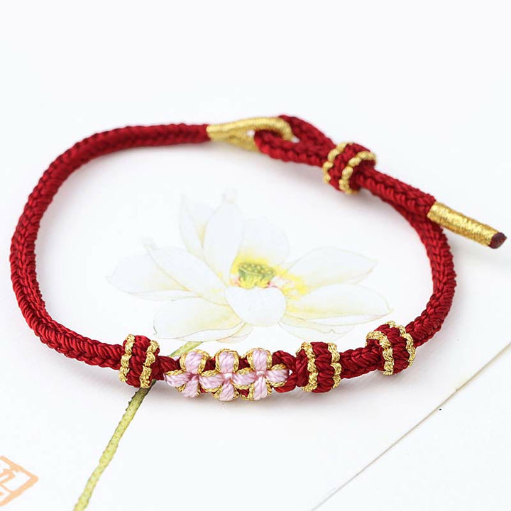 Buddha Stones手作りの三つの桃の花の幸運の8連編み紐ブレスレット