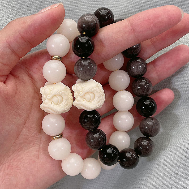 Buddha Stones銀の輝き 黒曜石 菩提樹の種 象牙 フルーツ ダンシングライオン 守護ブレスレット
