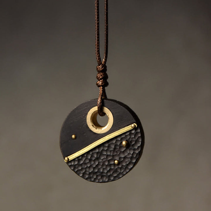 Buddha Stones手作りラウンド黒檀木製銅平和ネックレスペンダント