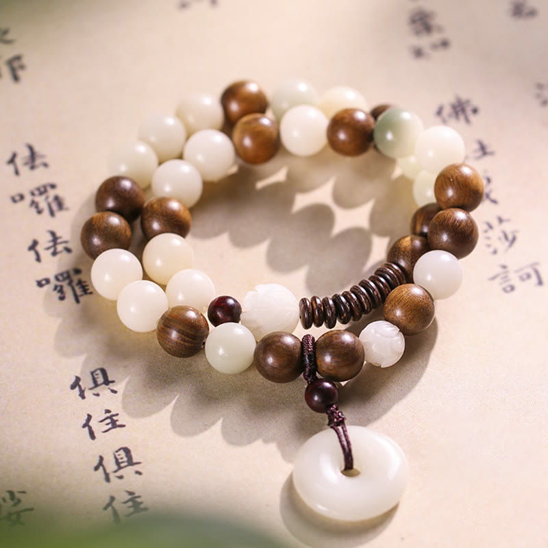 Buddha Stonesの種 グリーンサンダルウッド 蓮の平和のお守りチャームハーモニー ダブルラップブレスレット