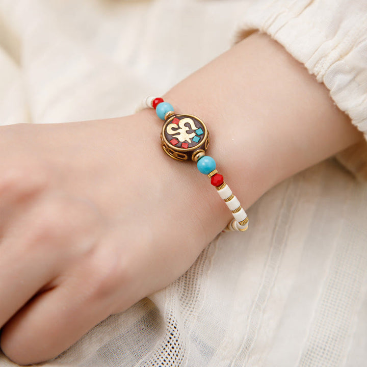 Buddha Stonesチベットターコイズオーム・マニ・パドメ・フム保護強さブレスレット