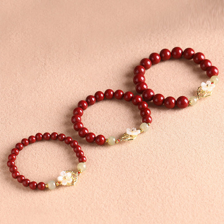 Buddha Stones天然辰砂翡翠ビーズ入りシャコガイ石花の祝福ブレスレット