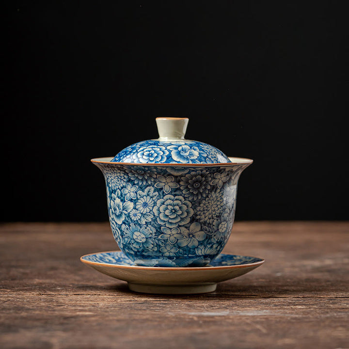 Buddha Stonesヴィンテージ青と白の磁器桃の花蓮牡丹セラミック蓋碗三彩ティーカップカンフーティーカップとソーサー蓋付き