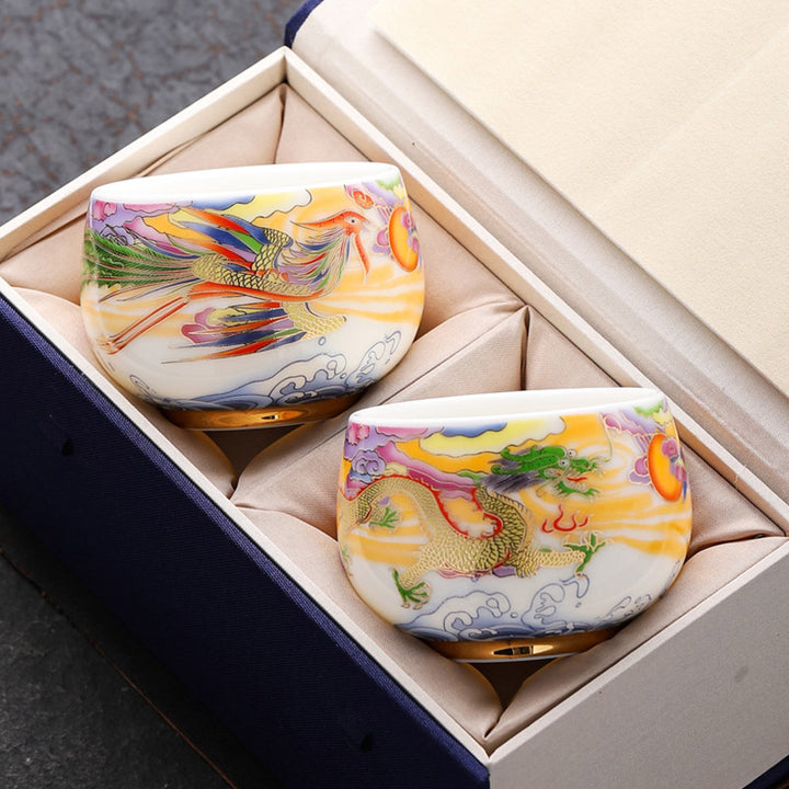 Buddha Stones、龍、鳳凰、吉兆の雲、太陽、海の波、陶器のティーカップ、カンフーティーカップ