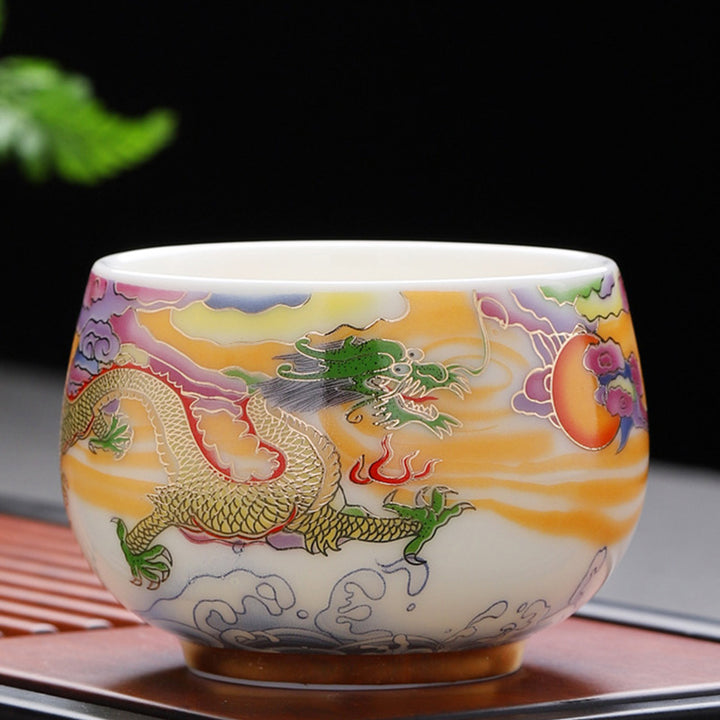 Buddha Stones、龍、鳳凰、吉兆の雲、太陽、海の波、陶器のティーカップ、カンフーティーカップ