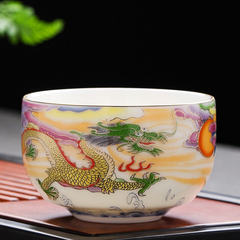 Buddha Stones、龍、鳳凰、吉兆の雲、太陽、海の波、陶器のティーカップ、カンフーティーカップ