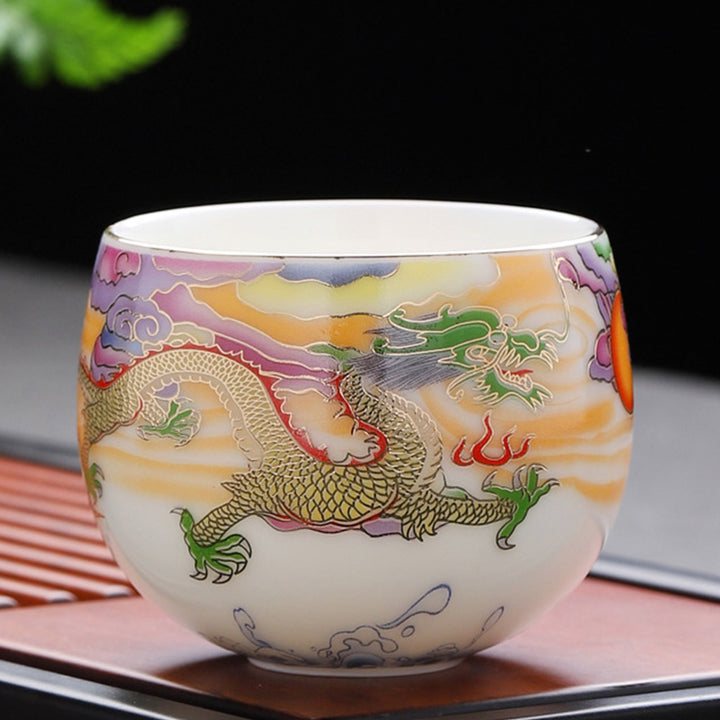 Buddha Stones、龍、鳳凰、吉兆の雲、太陽、海の波、陶器のティーカップ、カンフーティーカップ