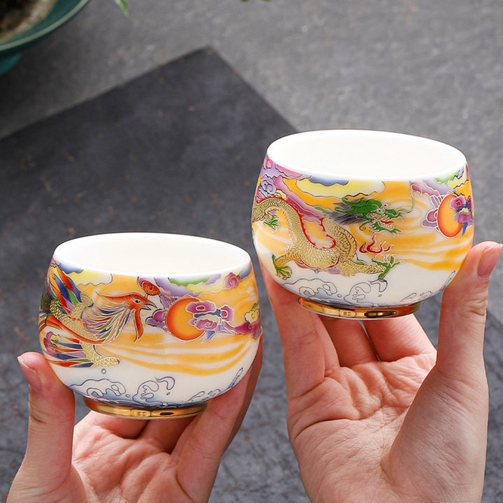 Buddha Stones、龍、鳳凰、吉兆の雲、太陽、海の波、陶器のティーカップ、カンフーティーカップ