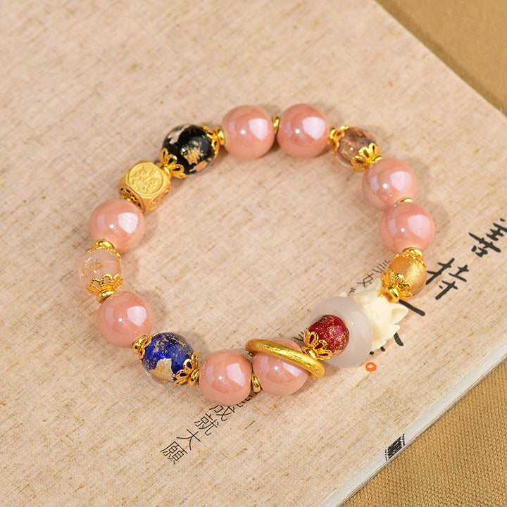 Buddha Stonesチベットのお香灰 琉璃ガラスビーズ 幸運の守護 九尾の狐のブレスレット