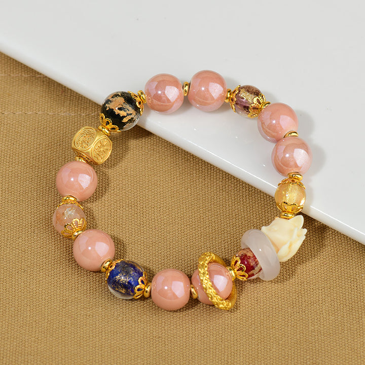 Buddha Stonesチベットのお香灰 琉璃ガラスビーズ 幸運の守護 九尾の狐のブレスレット