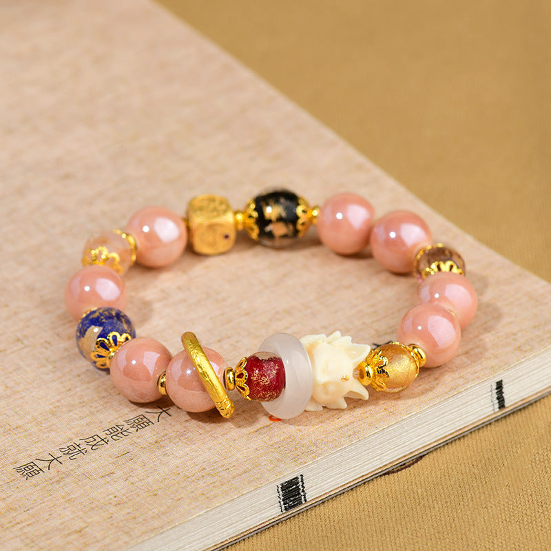 Buddha Stonesチベットのお香灰 琉璃ガラスビーズ 幸運の守護 九尾の狐のブレスレット