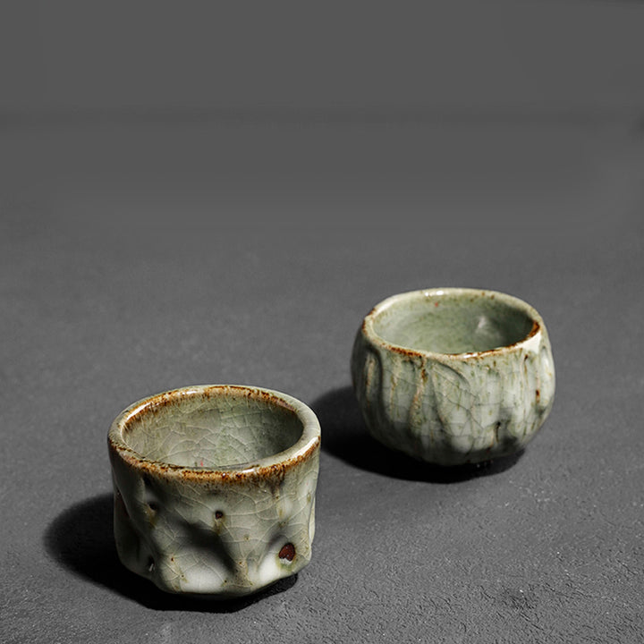 Buddha Stones手作りのシンプルなひび割れた氷の質感の中国Jianzhanセラミックティーカップカンフーティーカップ
