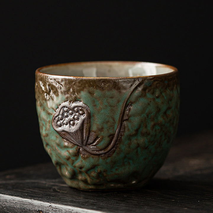 Buddha Stones、蓮の葉、花、縁起の良い雲、陶器のティーカップ、カンフーティーカップ