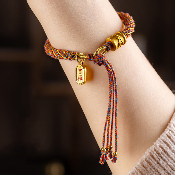 Buddha Stonesハンドメイドの多色チベットのオーム・マニ・パドメ・フム如意縁起の良いチャーム編みブレスレット