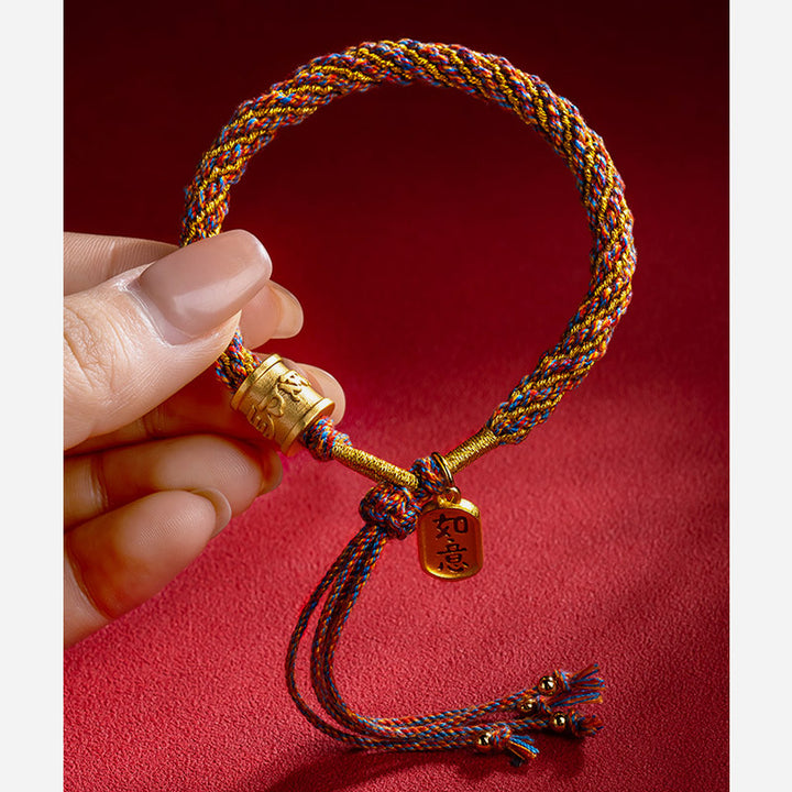 Buddha Stonesハンドメイドの多色チベットのオーム・マニ・パドメ・フム如意縁起の良いチャーム編みブレスレット