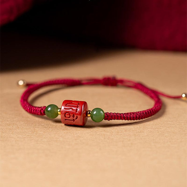 Buddha Stonesチベット 辰砂オーム・マニ・パドメ・フム刻印入り 祝福 編み込み ロープ ブレスレット