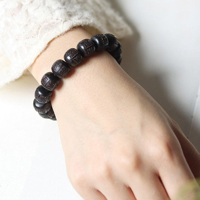 Buddha Stonesチベット黒檀オーム・マニ・パドメ・フム彫刻 バランスブレスレット