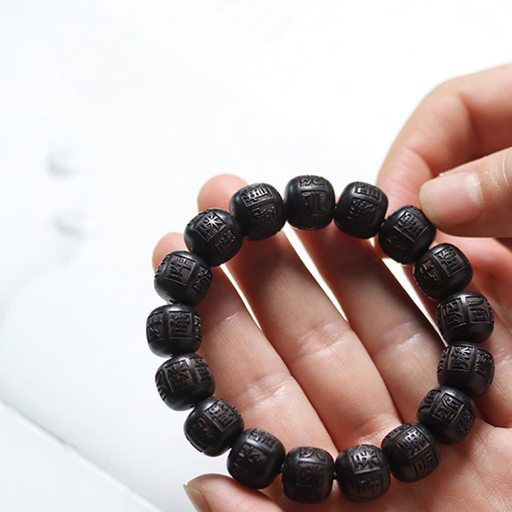 Buddha Stonesチベット黒檀オーム・マニ・パドメ・フム彫刻 バランスブレスレット